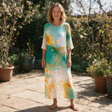 Tahlia spring dress front view on garden terrace