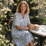 Nadine spring dress three quarter view at an outdoor cafe