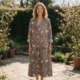 Gillian spring dress front view on garden terrace