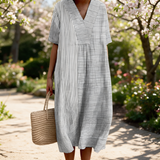 Robyn spring dress in a sunlit garden
