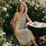 Bridie spring dress three quarter view at an outdoor cafe