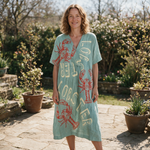 Kate spring dress front view on garden terrace