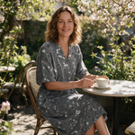 Delta spring dress three quarter view at an outdoor cafe