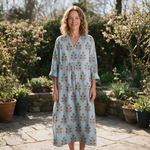 Wanda spring dress front view on garden terrace