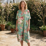 Evelyn spring dress front view on garden terrace