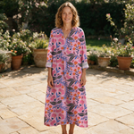 Clothilde spring dress front view on garden terrace