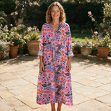 Clothilde spring dress front view on garden terrace