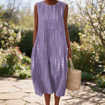 Roxanne spring dress in a sunlit garden