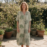 Luise spring dress front view on garden terrace