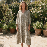 Lucy spring dress front view on garden terrace