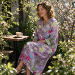 Pippa spring dress three quarter view at an outdoor cafe