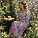 Pippa spring dress three quarter view at an outdoor cafe