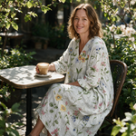 Belinda spring dress three quarter view at an outdoor cafe