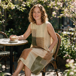 Geraldine spring dress three quarter view at an outdoor cafe