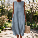 Marlene spring dress in a sunlit garden