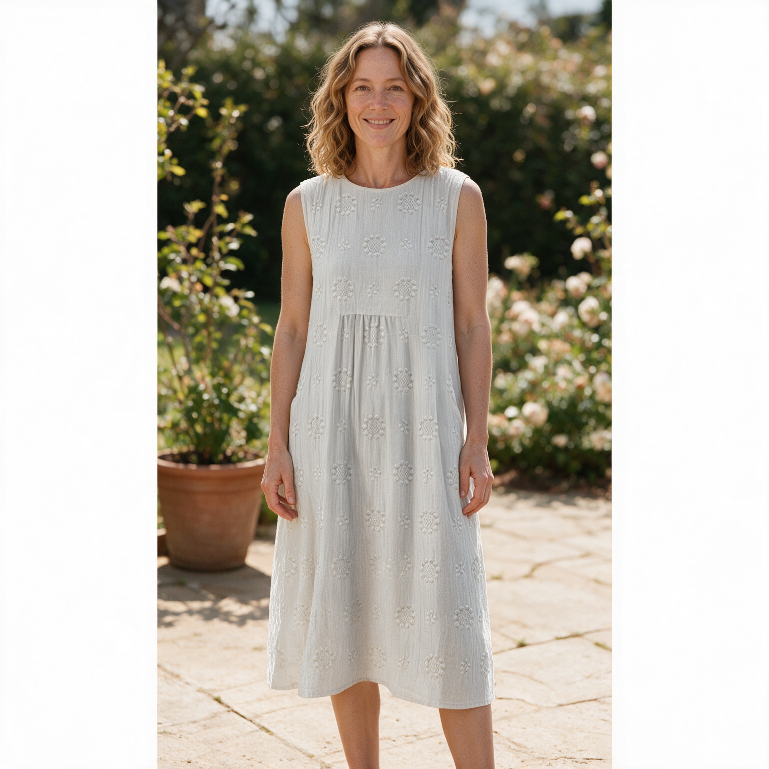 Faye spring dress front view on garden terrace