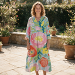Linaëlle spring dress front view on garden terrace