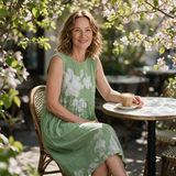 Liloue spring dress three quarter view at an outdoor cafe