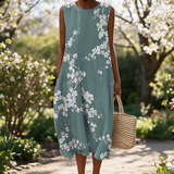 Tanya spring dress in a sunlit garden