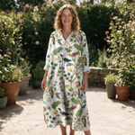Elise spring dress front view on garden terrace