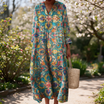 Nicole spring dress in a sunlit garden