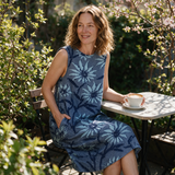 Yvonne spring dress three quarter view at an outdoor cafe
