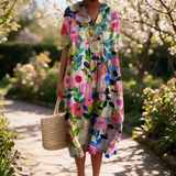 Caline spring dress in a sunlit garden