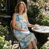 Penny spring dress three quarter view at an outdoor cafe