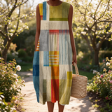 Jacinta spring dress in a sunlit garden
