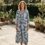 Lilouette spring dress front view on garden terrace