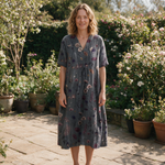 Marnie spring dress front view on garden terrace
