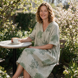 Luise spring dress three quarter view at an outdoor cafe