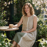 Sharyn spring dress three quarter view at an outdoor cafe