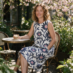 Zara spring dress three quarter view at an outdoor cafe