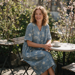 Frances spring dress three quarter view at an outdoor cafe