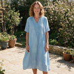 Leanne spring dress front view on garden terrace