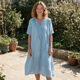 Leanne spring dress front view on garden terrace