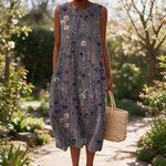 Merle spring dress in a sunlit garden