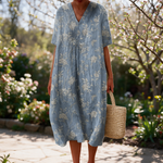 Frances spring dress in a sunlit garden