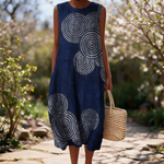 Maraïke spring dress in a sunlit garden