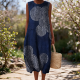 Maraïke spring dress in a sunlit garden