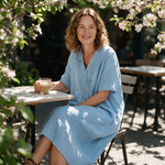 Leanne spring dress three quarter view at an outdoor cafe