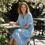 Leanne spring dress three quarter view at an outdoor cafe
