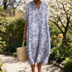 Nadine spring dress in a sunlit garden