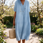 Leanne spring dress in a sunlit garden