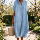 Leanne spring dress in a sunlit garden