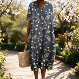 Marika spring dress in a sunlit garden