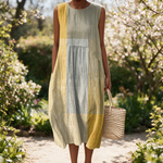 Bridie spring dress in a sunlit garden