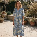 Lisou spring dress front view on garden terrace