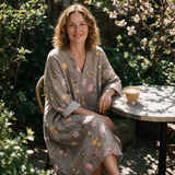 Gillian spring dress three quarter view at an outdoor cafe